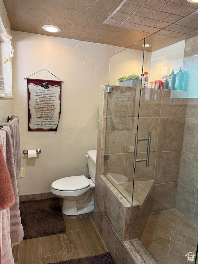 2936 E Ln Joya Dr S, Holladay, UT 84124 - bathroom with a stall shower and wood finished floors