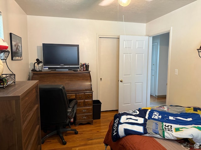 2936 E Ln Joya Dr S, Holladay, UT 84124 - bedroom with wood finished floors and a desk