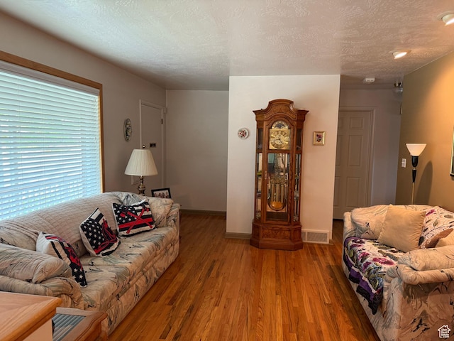 2936 E Ln Joya Dr S, Holladay, UT 84124 - living area with wood finished floors and a textured ceiling