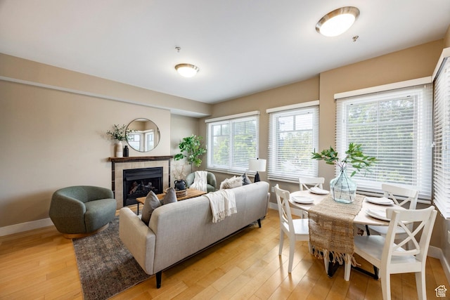 1988 S 1100 E Unit 308, Salt Lake City, UT 84105 - living room with light wood finished floors and a tiled fireplace