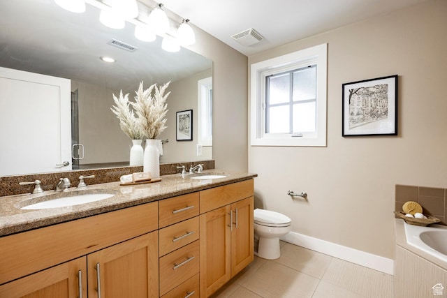 1988 S 1100 E Unit 308, Salt Lake City, UT 84105 - full bath with double vanity, a garden tub, and tile patterned floors