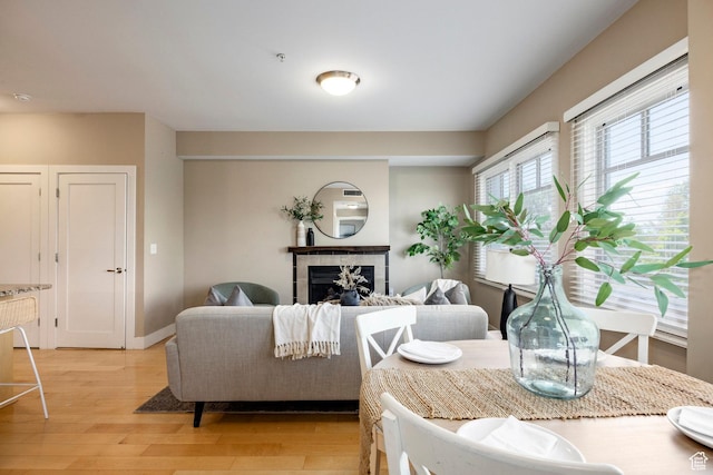 1988 S 1100 E Unit 308, Salt Lake City, UT 84105 - dining room featuring light wood-style flooring and a fireplace