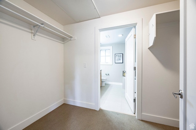 1988 S 1100 E Unit 308, Salt Lake City, UT 84105 - spacious closet featuring attic access and tile patterned floors