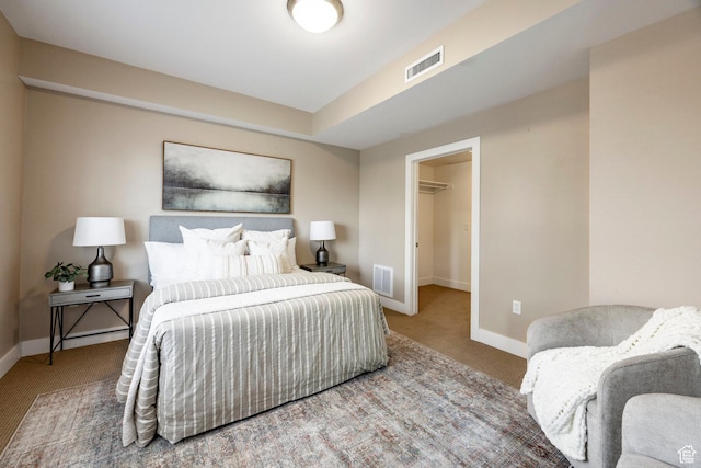 1988 S 1100 E Unit 308, Salt Lake City, UT 84105 - carpeted bedroom with baseboards and a spacious closet