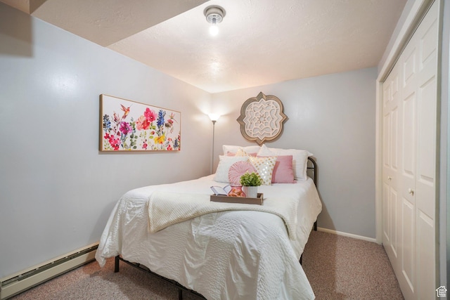 117 E 300 S, Gunnison, UT 84634 - bedroom with baseboard heating, carpet floors, and a closet