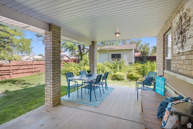 117 E 300 S, Gunnison, UT 84634 - fenced backyard with outdoor dining space and a patio area