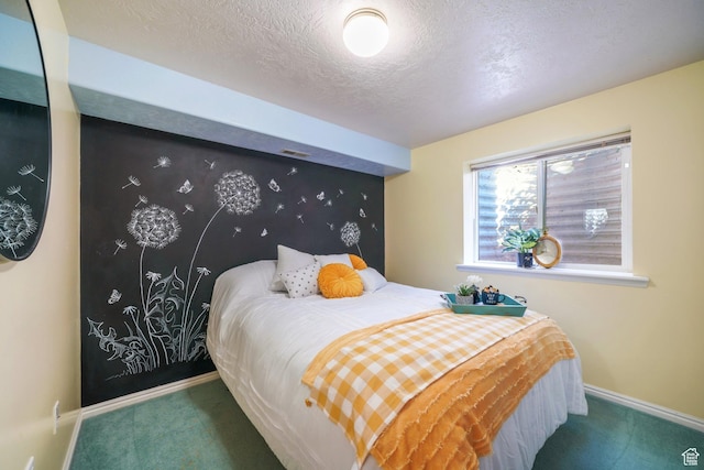 117 E 300 S, Gunnison, UT 84634 - carpeted bedroom featuring baseboards and a textured ceiling