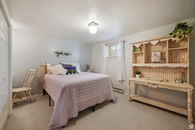 117 E 300 S, Gunnison, UT 84634 - bedroom featuring light colored carpet, a textured ceiling, and a baseboard radiator