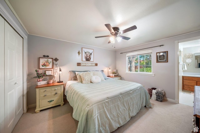 117 E 300 S, Gunnison, UT 84634 - bedroom with light colored carpet, a closet, ensuite bath, ceiling fan, and ornamental molding