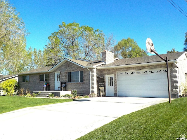117 E 300 S, Gunnison, UT 84634 - ranch-style house featuring an attached garage, brick siding, driveway, a front yard, and a chimney