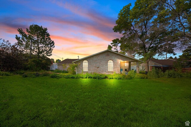 117 E 300 S, Gunnison, UT 84634 - back of property with a yard and brick siding