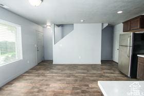 280 N 750 E, Vineyard, UT 84059 - kitchen featuring freestanding refrigerator, dark brown cabinetry, wood finished floors, and recessed lighting