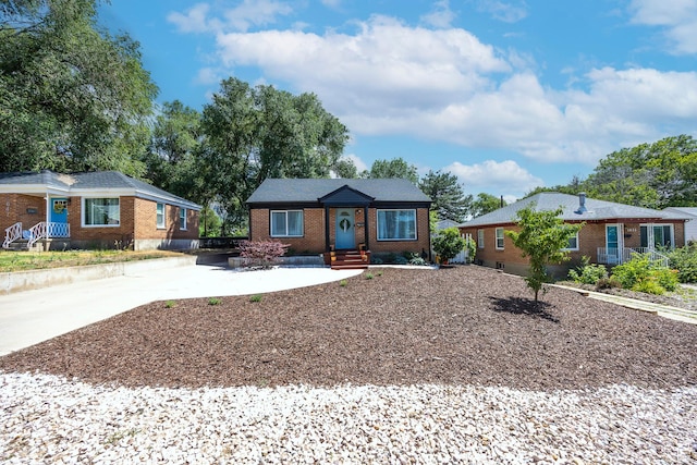 1639 20th S, Ogden, UT 84401 - view of front of property featuring concrete driveway and brick siding