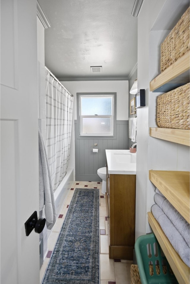 1639 20th S, Ogden, UT 84401 - bathroom with vanity, a wainscoted wall, and shower / bath combo