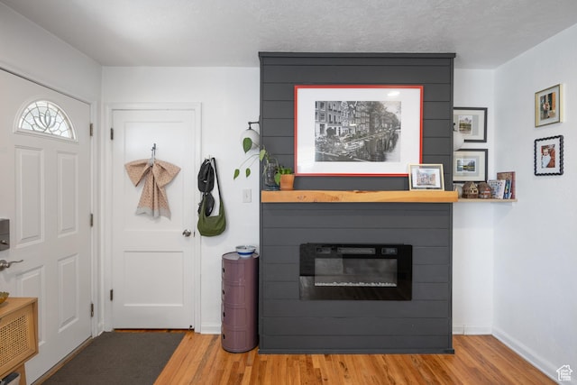 1639 20th S, Ogden, UT 84401 - living area featuring wood finished floors and a fireplace