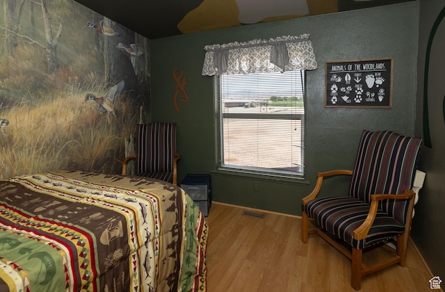 205 W 575 S, Venice, UT 84701 - bedroom featuring wood finished floors and multiple windows