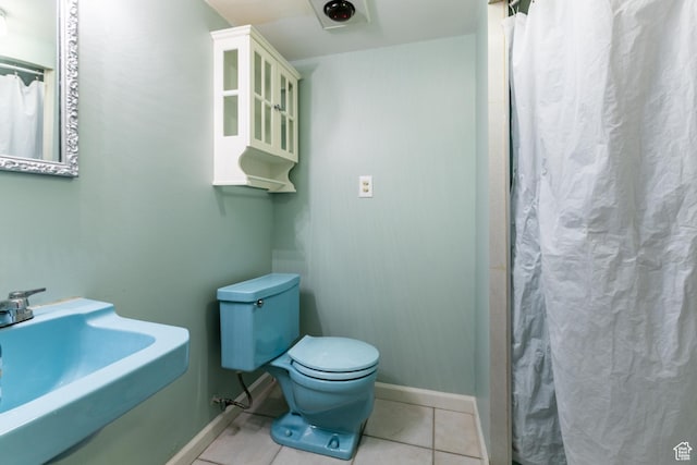 5681 S Calann Dr E, Holladay, UT 84121 - full bathroom featuring tile patterned flooring and curtained shower