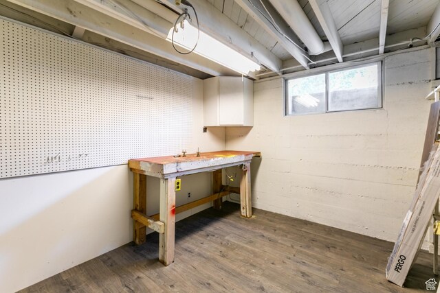 5681 S Calann Dr E, Holladay, UT 84121 - basement featuring a workshop area and wood finished floors