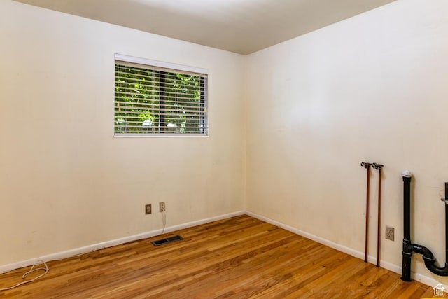 5681 S Calann Dr E, Holladay, UT 84121 - spare room with wood finished floors and baseboards