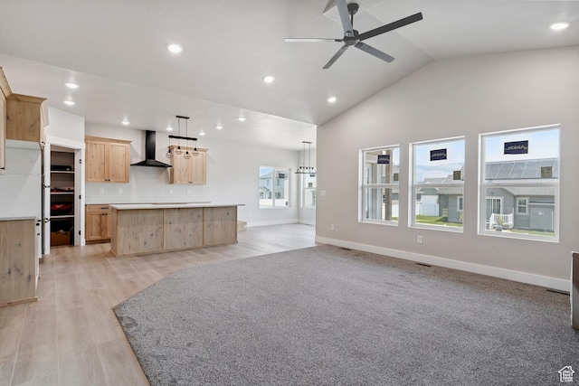 1856 S 2575 W, West Haven, UT 84401 - unfurnished living room featuring ceiling fan, recessed lighting, lofted ceiling, and light wood finished floors