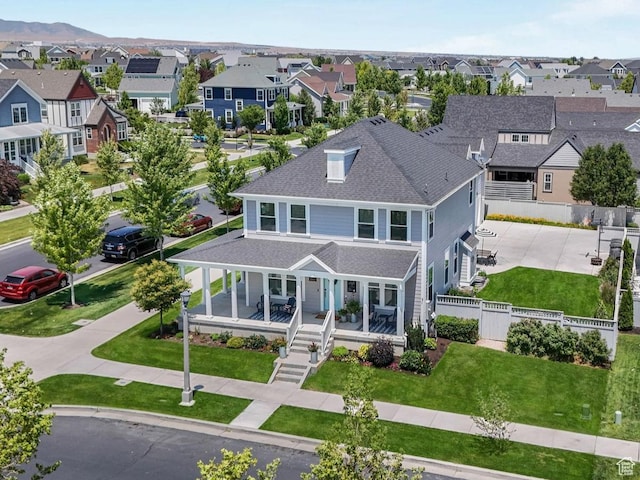 4966 W Kitsap Way Unit 10-532, South Jordan, UT 84009 - view of front of property with a residential view, roof with shingles, covered porch, and concrete driveway