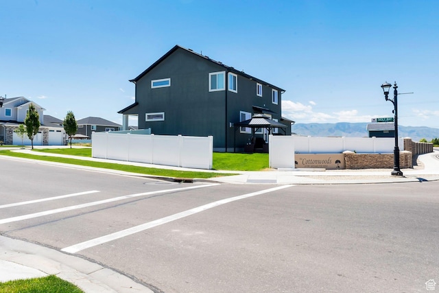 142 W Hackberry Rd, Vineyard, UT 84059 - view of asphalt road with sidewalks, curbs, and street lights