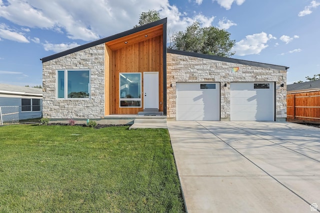 3839 W Saddler Dr, West Jordan, UT 84088 - contemporary home featuring stone siding, concrete driveway, and a garage