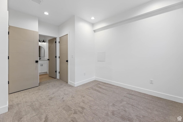 3839 W Saddler Dr, West Jordan, UT 84088 - unfurnished bedroom with light carpet and recessed lighting