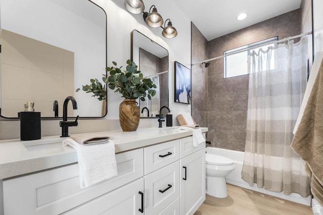 3839 W Saddler Dr, West Jordan, UT 84088 - full bathroom with double vanity, shower / tub combo, wood finished floors, and recessed lighting