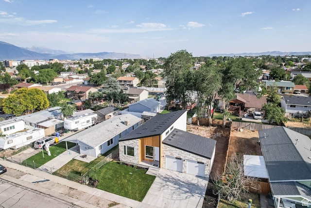 3839 W Saddler Dr, West Jordan, UT 84088 - aerial perspective of suburban area with a mountain backdrop