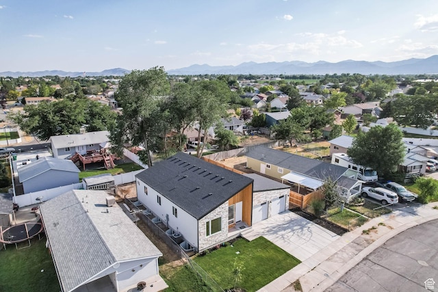 3839 W Saddler Dr, West Jordan, UT 84088 - aerial perspective of suburban area featuring a mountainous background