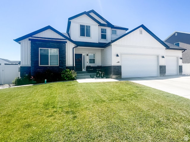 291 W 950 S, Vernal, UT 84078 - view of front of house with an attached garage, concrete driveway, and board and batten siding