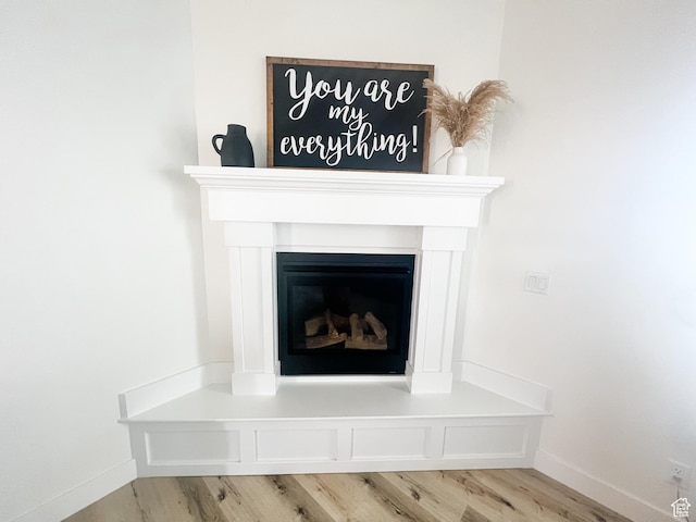 291 W 950 S, Vernal, UT 84078 - detailed view of wood finished floors and a fireplace
