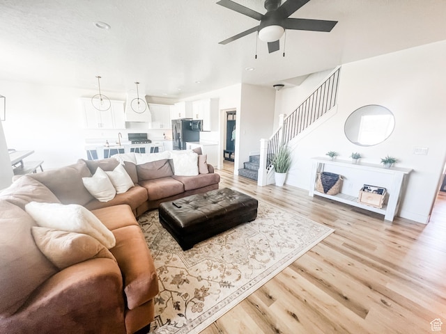 291 W 950 S, Vernal, UT 84078 - living area featuring light wood-style floors, stairway, ceiling fan, and recessed lighting