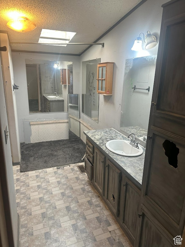419 E 700 N, Vernal, UT 84078 - bathroom featuring vanity and a textured ceiling