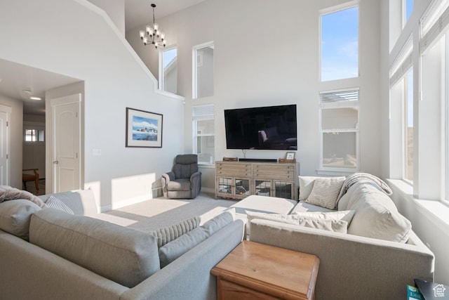 12333 S Pesky Ln, Herriman, UT 84096 - living room with a high ceiling and a chandelier