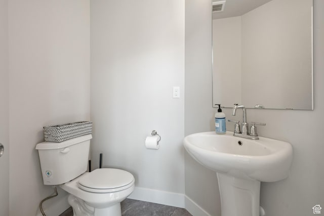 12333 S Pesky Ln, Herriman, UT 84096 - bathroom with toilet and baseboards