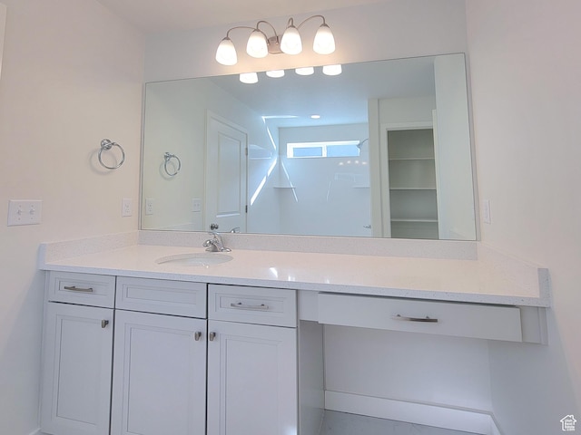 6767 S Glade Creek Dr Unit 230, West Jordan, UT 84081 - bathroom with vanity and a closet