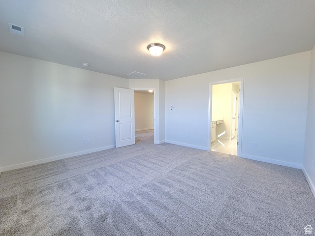 6767 S Glade Creek Dr Unit 230, West Jordan, UT 84081 - unfurnished room with light colored carpet and a textured ceiling