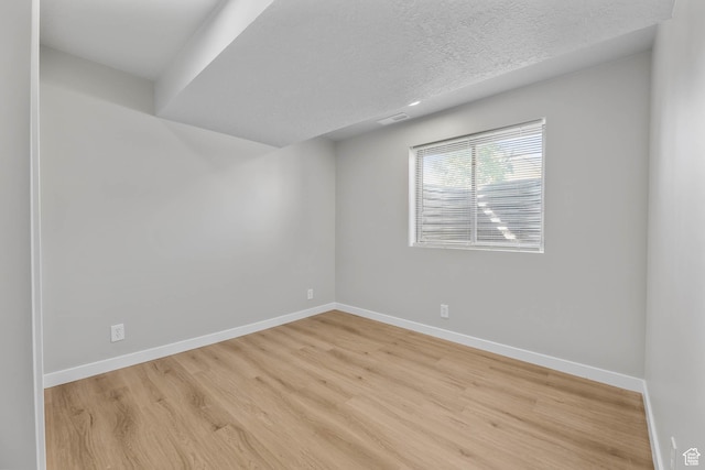 77 W 525 N, Layton, UT 84041 - unfurnished room with wood finished floors and a textured ceiling