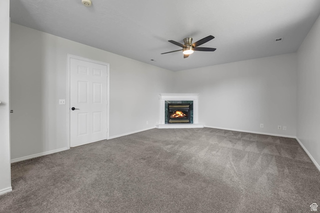 77 W 525 N, Layton, UT 84041 - unfurnished living room featuring carpet flooring, a ceiling fan, and a fireplace