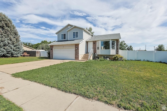77 W 525 N, Layton, UT 84041 - view of front of property with brick siding, a garage, and concrete driveway