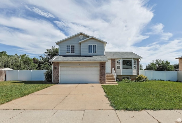 77 W 525 N, Layton, UT 84041 - split level home with a garage, brick siding, concrete driveway, and a shingled roof