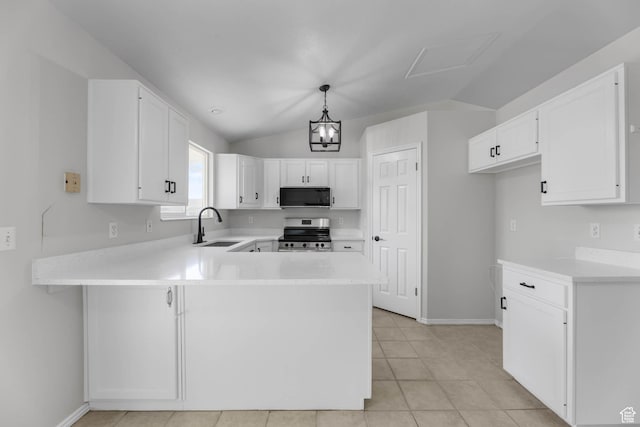 77 W 525 N, Layton, UT 84041 - kitchen featuring black microwave, stainless steel range with electric stovetop, a peninsula, light countertops, and vaulted ceiling