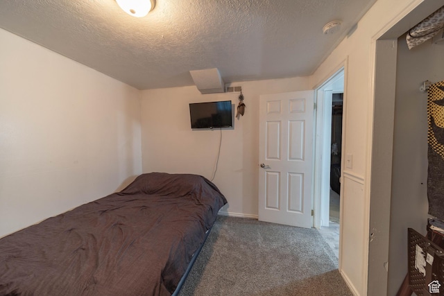 988 N Smith Dr, Price, UT 84501 - carpeted bedroom featuring a textured ceiling