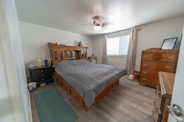 988 N Smith Dr, Price, UT 84501 - bedroom with wood finished floors and a ceiling fan