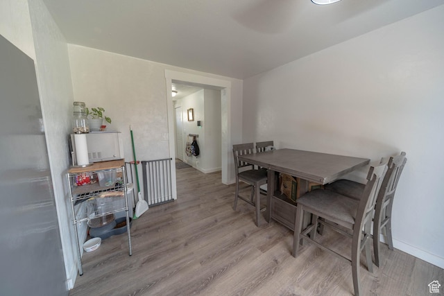 988 N Smith Dr, Price, UT 84501 - dining room featuring wood finished floors and baseboards