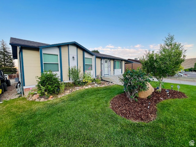 988 N Smith Dr, Price, UT 84501 - view of front of house featuring a front lawn