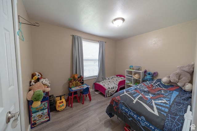 988 N Smith Dr, Price, UT 84501 - bedroom with wood finished floors