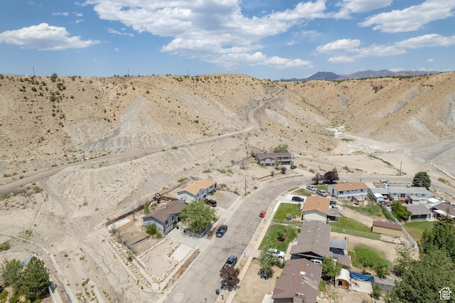 988 N Smith Dr, Price, UT 84501 - aerial view of property and surrounding area with a mountain backdrop and nearby suburban area